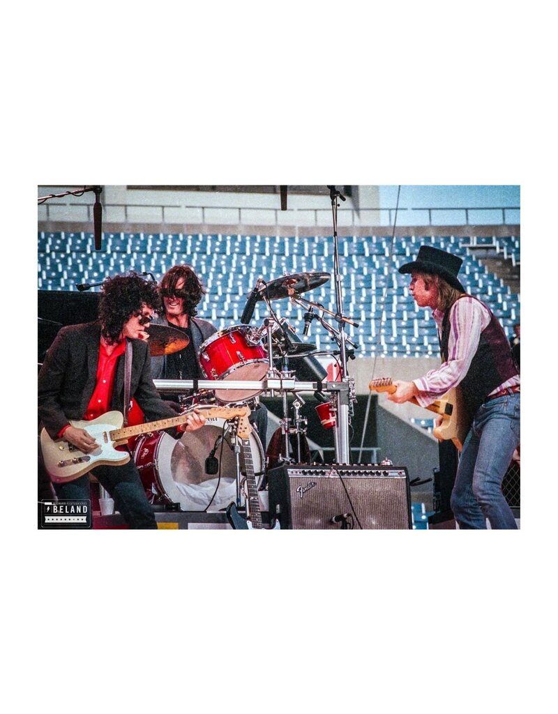 Beland Tom Petty with Heartbreakers Stan Lynch and Mike Campbell at Rich Stadium, Buffalo 1986 by Richard Beland