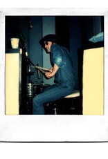 Pang Doing A “Ringo”, Burbank, CA 1974 by May Pang