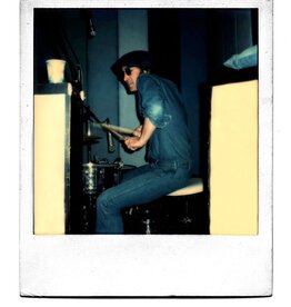 Pang Doing A “Ringo”, Burbank, CA 1974 by May Pang