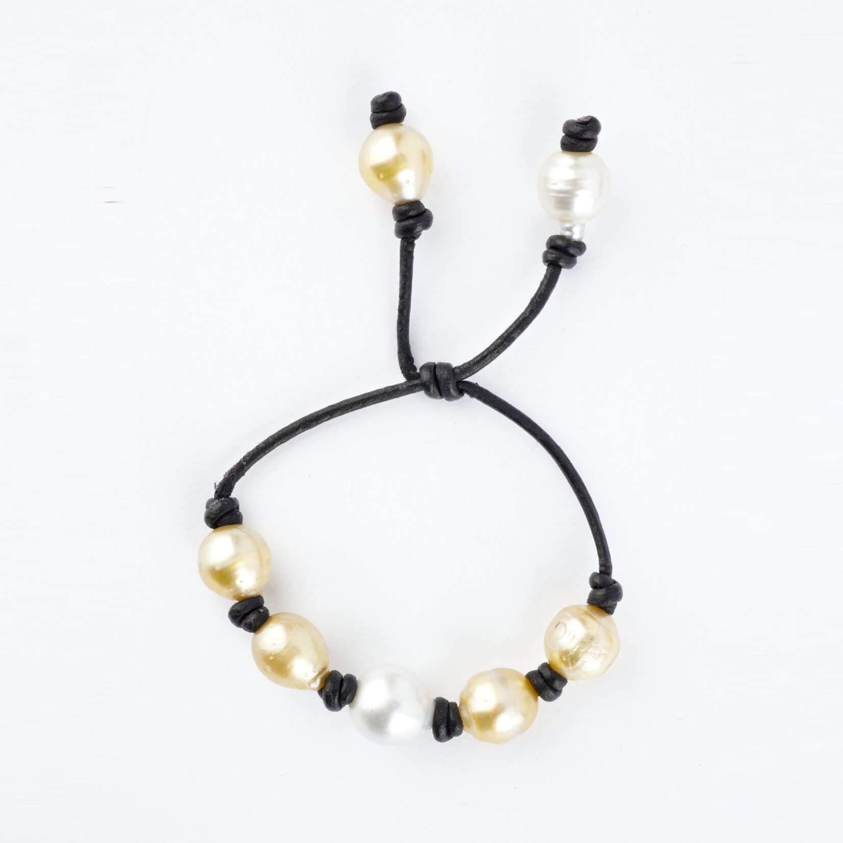 Mina Danielle Yellow and White South Sea and Tahitian Pearl Bracelet on Black Leather Cord with adjustable sliding closure.