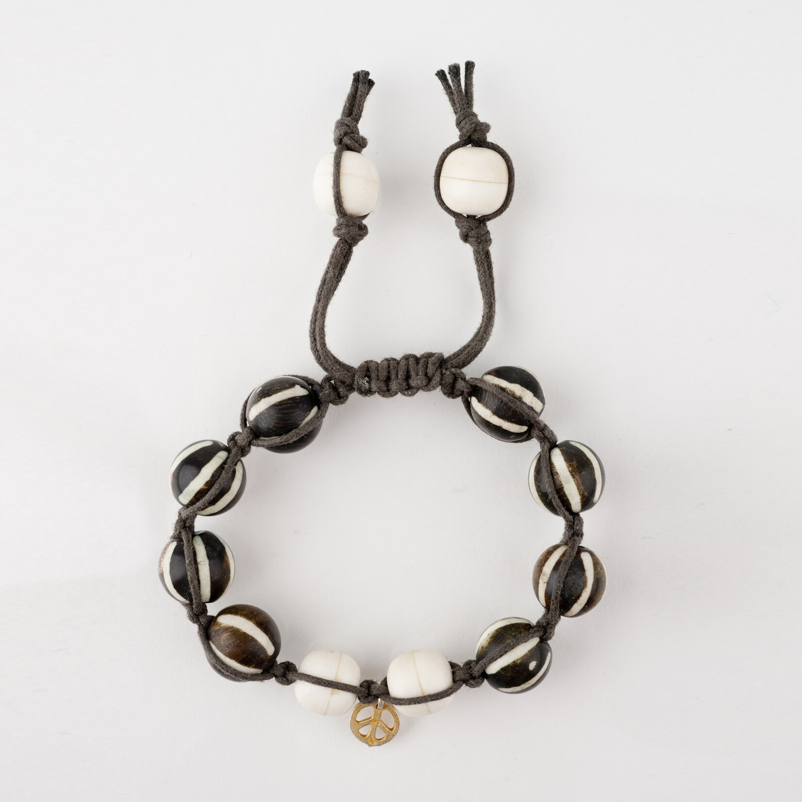 Mina Danielle Macrame Brown and White Bone Beads with Gold Peace Charm