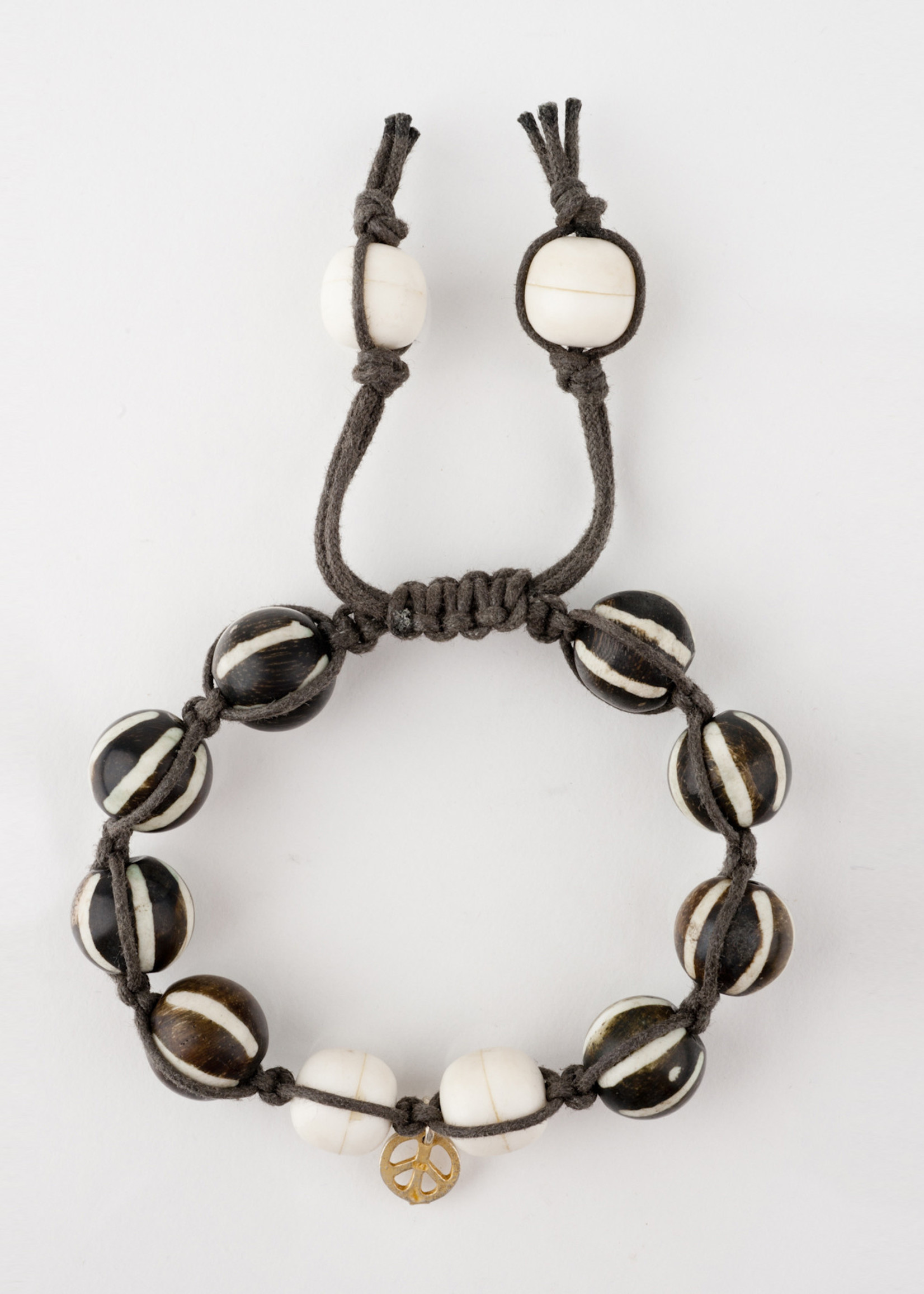 Mina Danielle Macramé Brown and White Bone Beads with Gold Peace Charm
