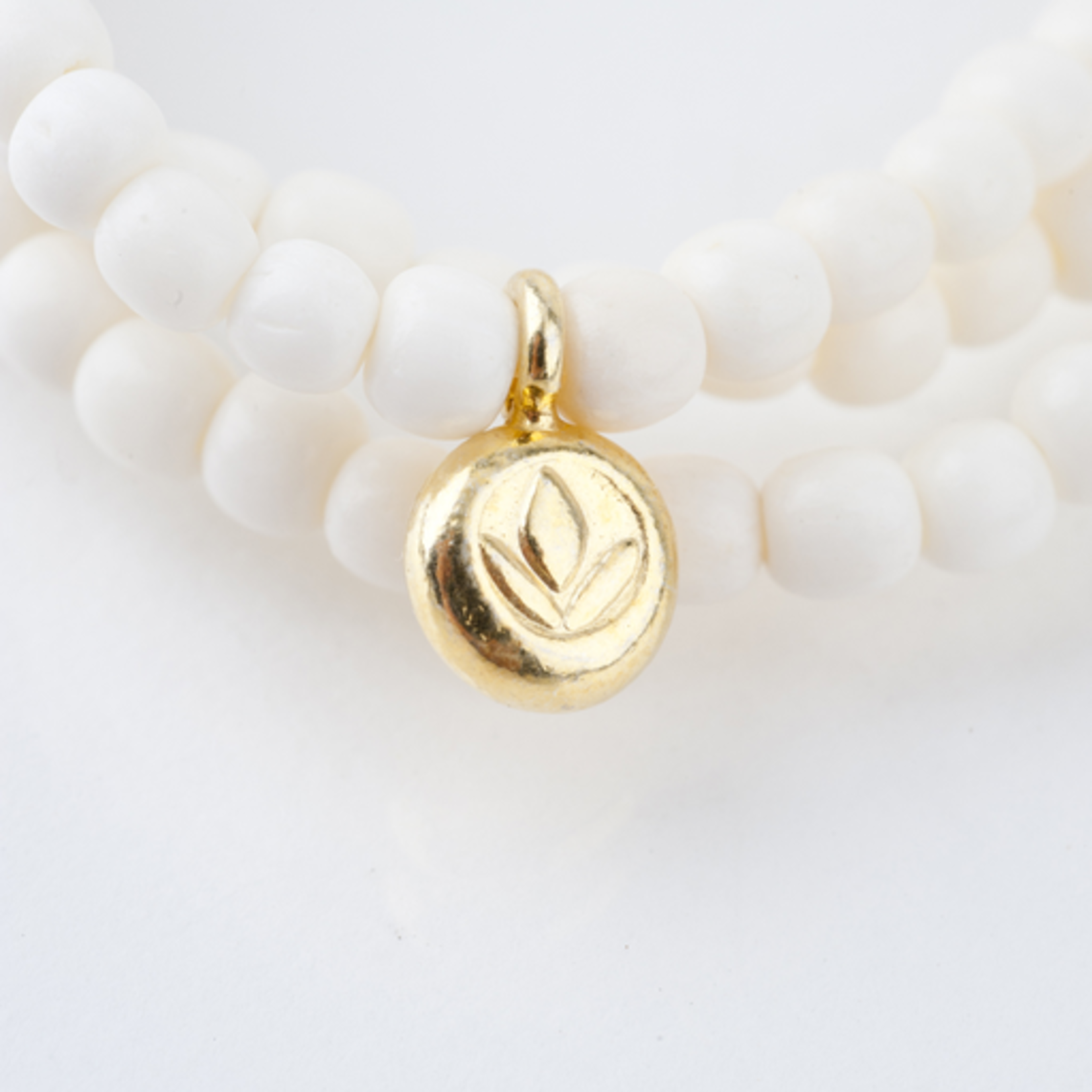 Mina Danielle White Bone Wrap with Gold Lotus Charm and Stardust Bead