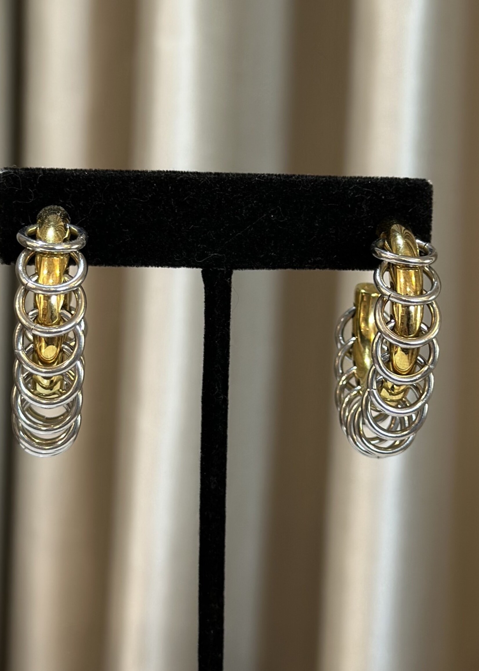 Gold earrings with silver rings