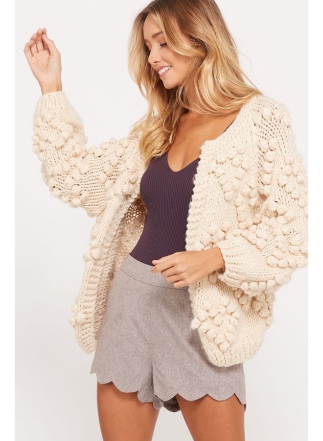 cardigan pom pom