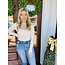 The Uptown Peach Pretty & Basic Cream Bodysuit