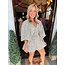 The Uptown Peach Leah Leopard Print Romper