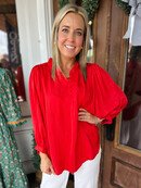 Buttoned Up in Red Blouse