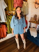 The Smocked and Ruffled Denim Romper
