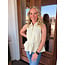 The Uptown Peach Cristian’s Cream Ruffle Top