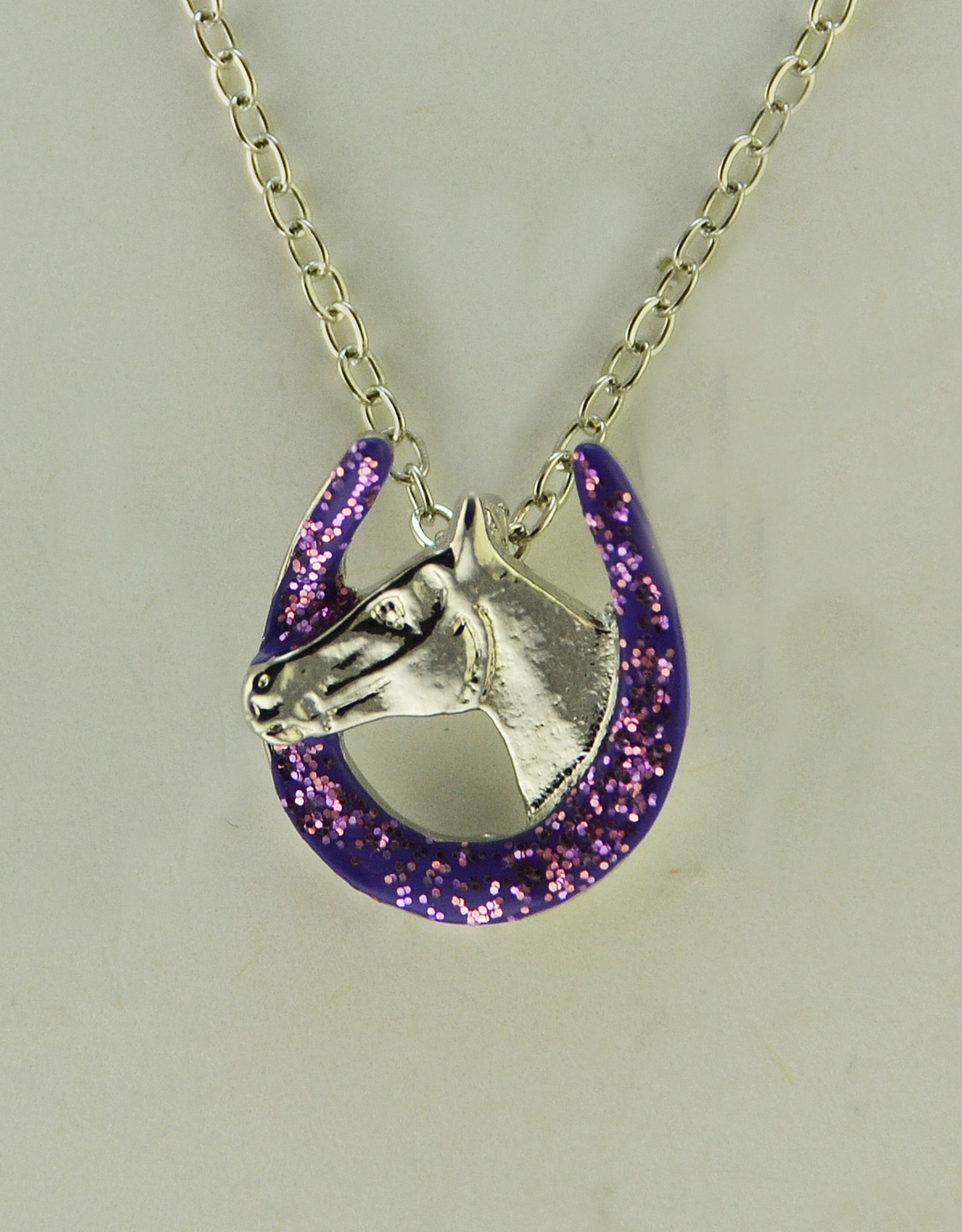 Horse head in purple glitter horse shoe necklace