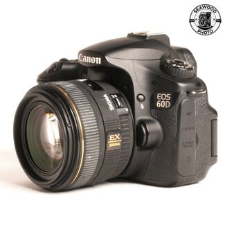 Canon Canon 60D w/ Sigma 30mm f1.4 GOOD+