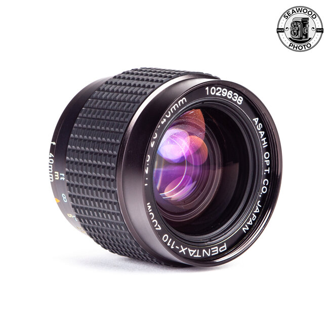 Pentax-110 Zoom 20-40mm F/2.8 w/ Hood - GOOD+