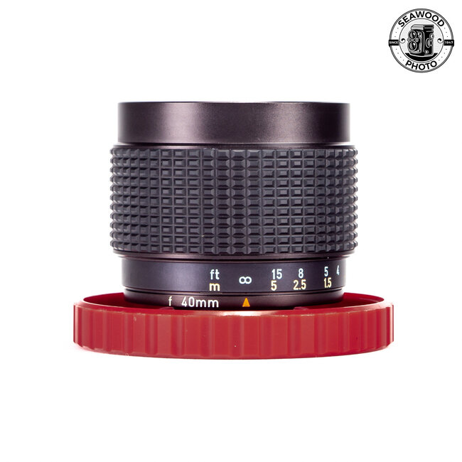 Pentax-110 Zoom 20-40mm F/2.8 w/ Hood - GOOD+