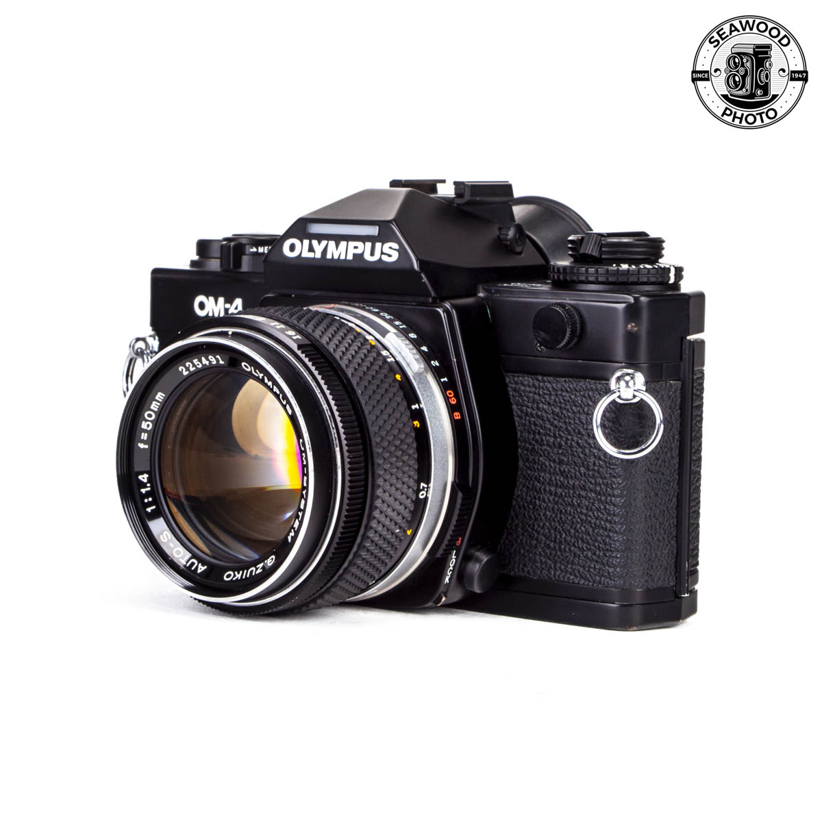 Olympus OM-4 w/ Zuiko 50mm f/1.4 GOOD+ - Seawood Photo