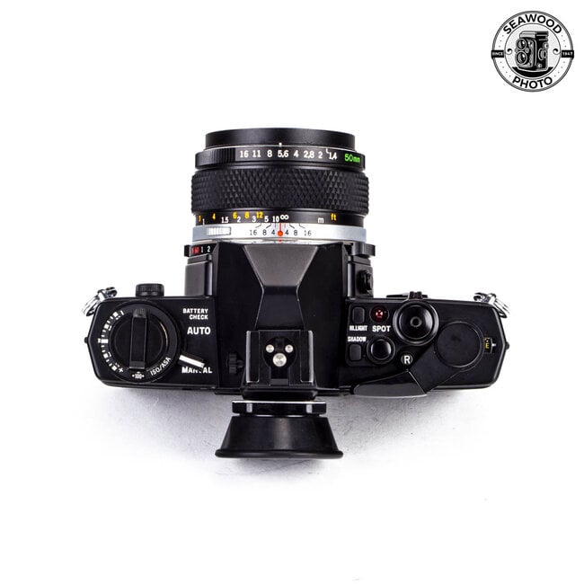 Olympus OM-4 w/ Zuiko 50mm f/1.4 GOOD+