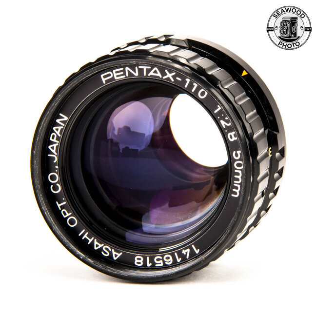 Pentax Auto 110 with 18mm, 50mm, and 70mm f2.8 lens GOOD+