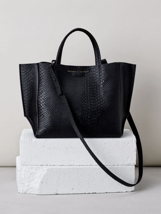 Ampersand as apostrophe underbed sideways leather tote