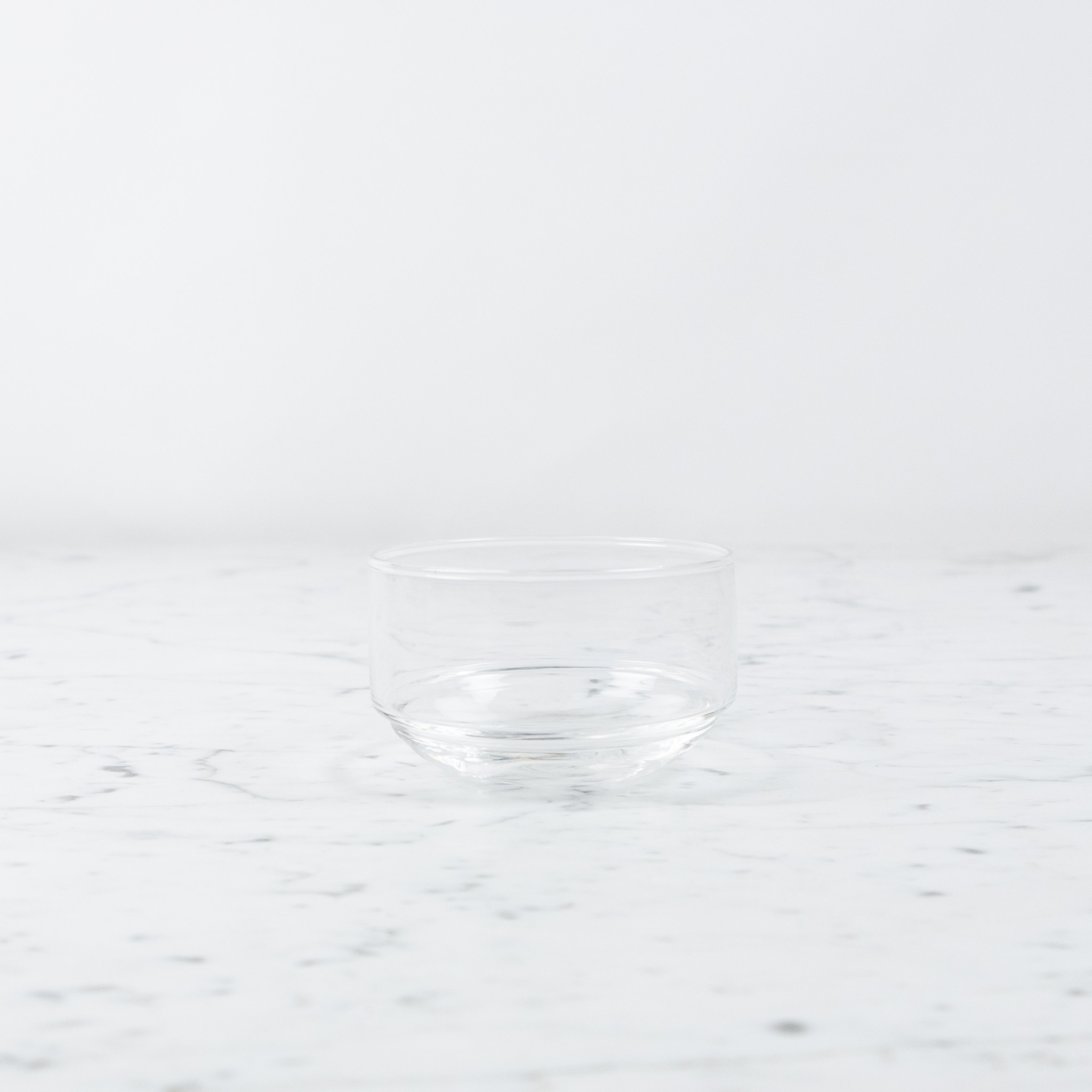 https://cdn.shoplightspeed.com/shops/625731/files/44861417/rounded-bottom-glass-stacking-bowl.jpg