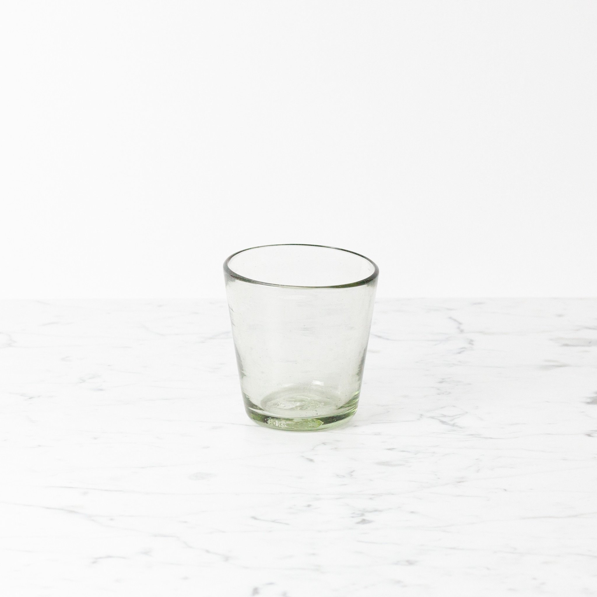 on the rocks, hand-blown clear drinking glass