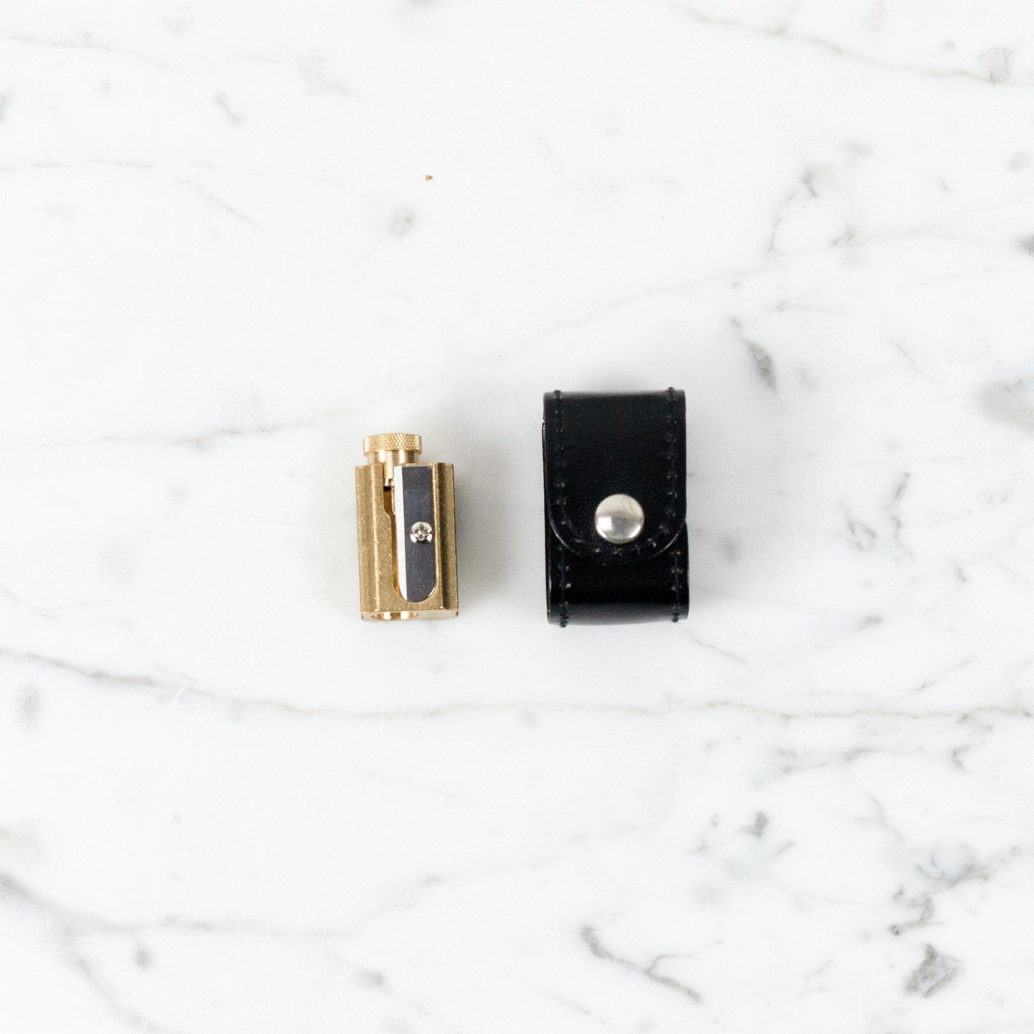 DUX Brass Adjustable Pencil Sharpener in Black Leather Case