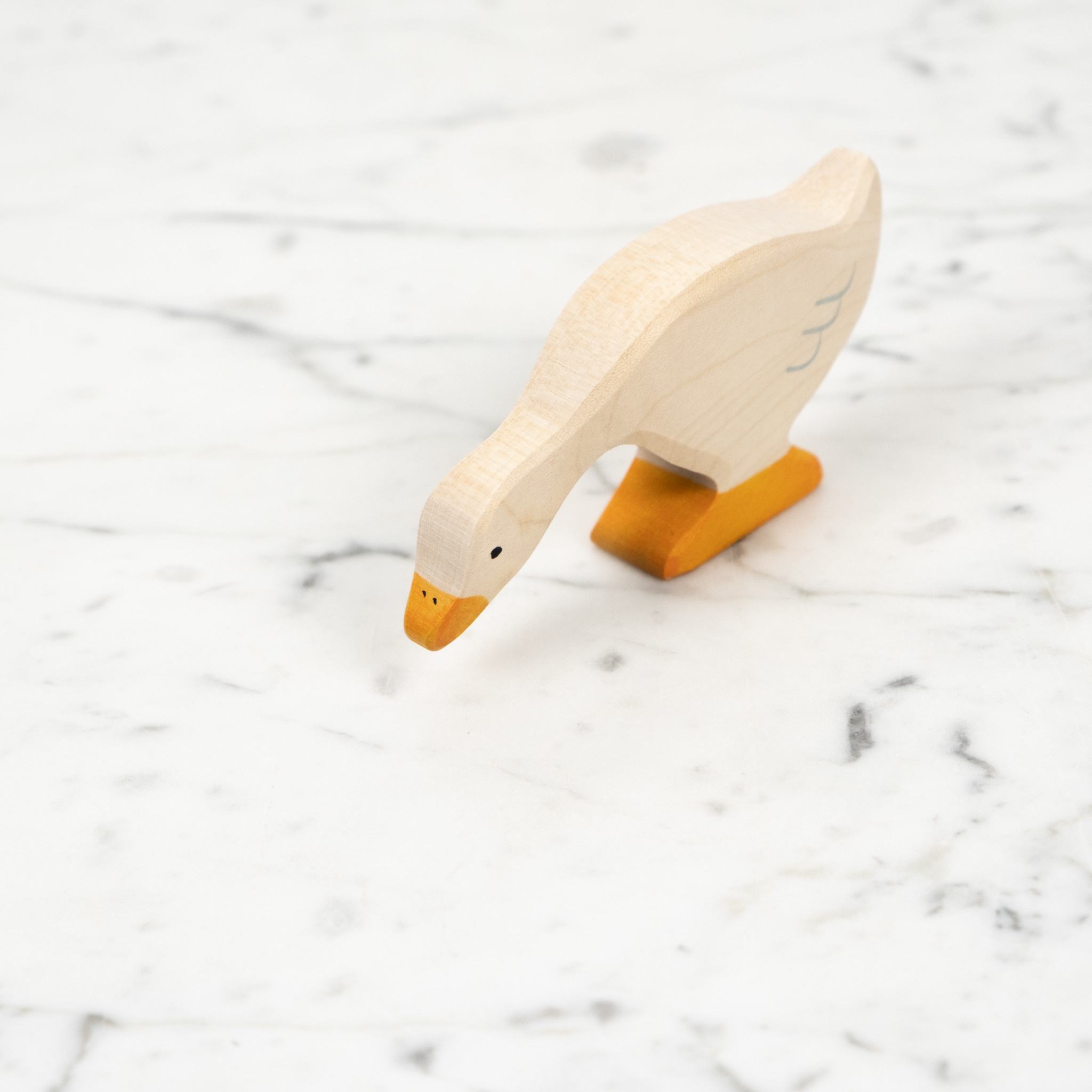 Wooden Goose Eating