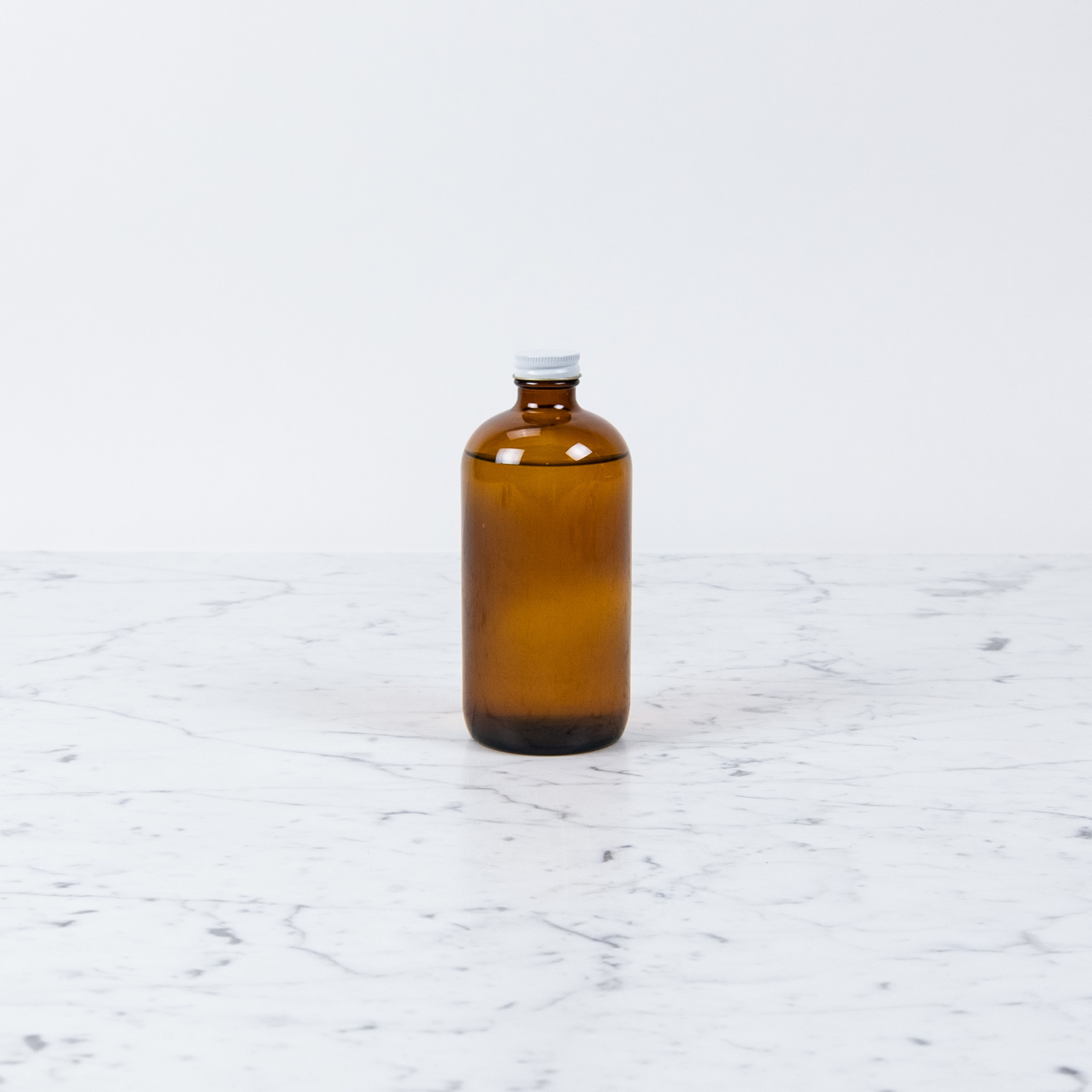 The Foundry Home Goods Unscented Laundry Detergent in 32oz Amber Glass Bottle