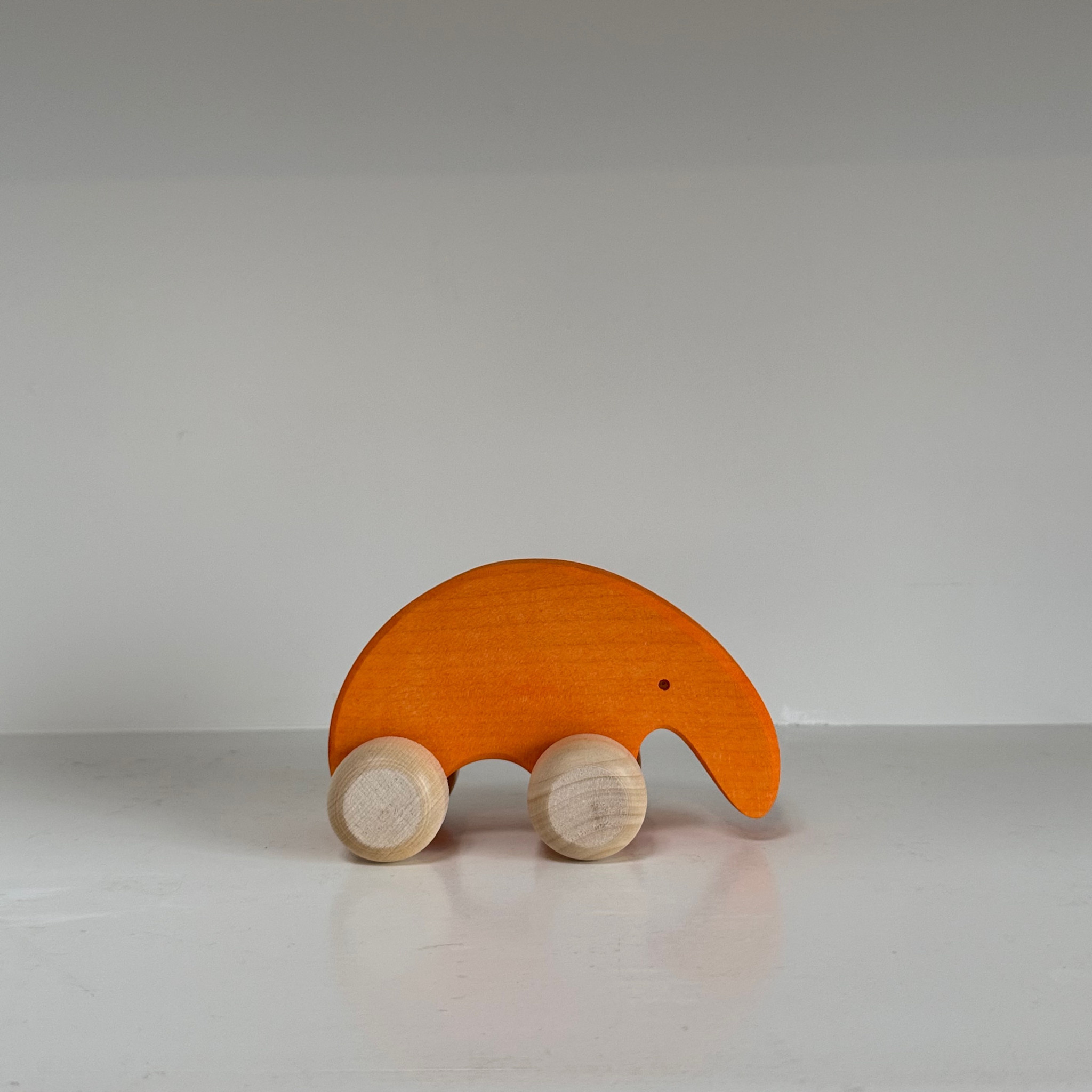 Abstract Wooden Orange Armadillo Friend on Wheels