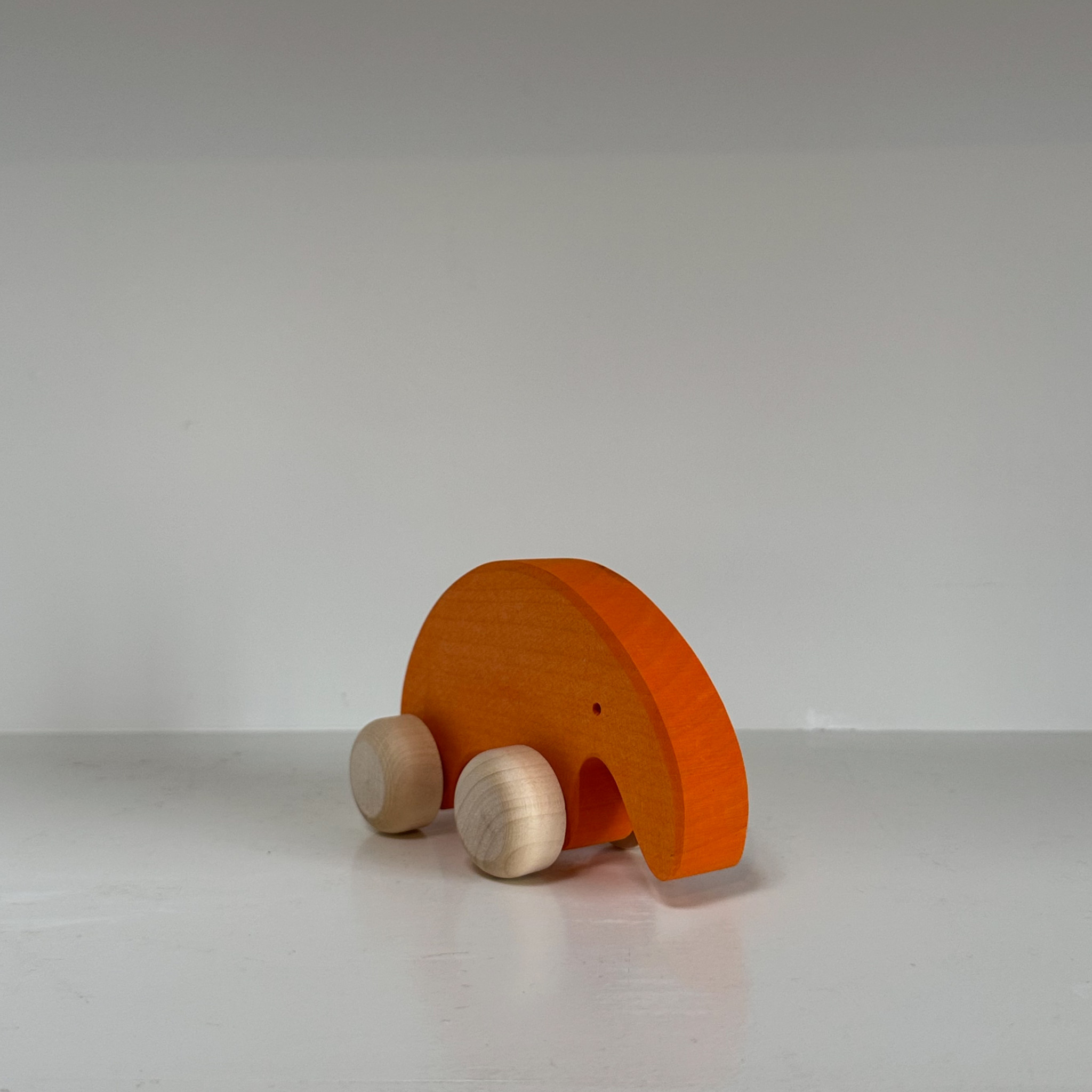 Abstract Wooden Orange Armadillo Friend on Wheels