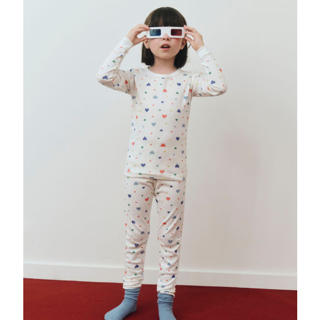 Children's pyjamas in cotton with a heart print and snug-fitting legs