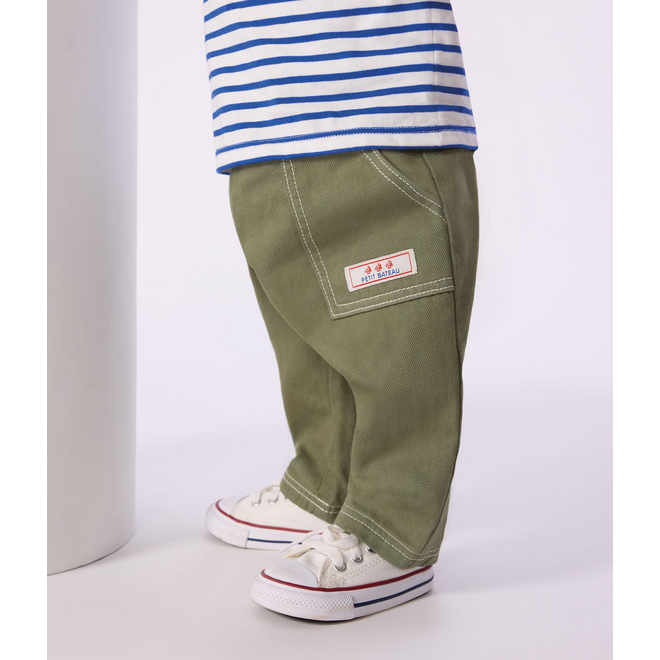 Babies' plain, coloured denim trousers