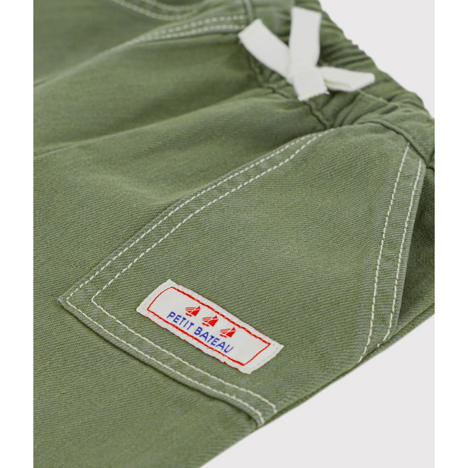 Babies' plain, coloured denim trousers