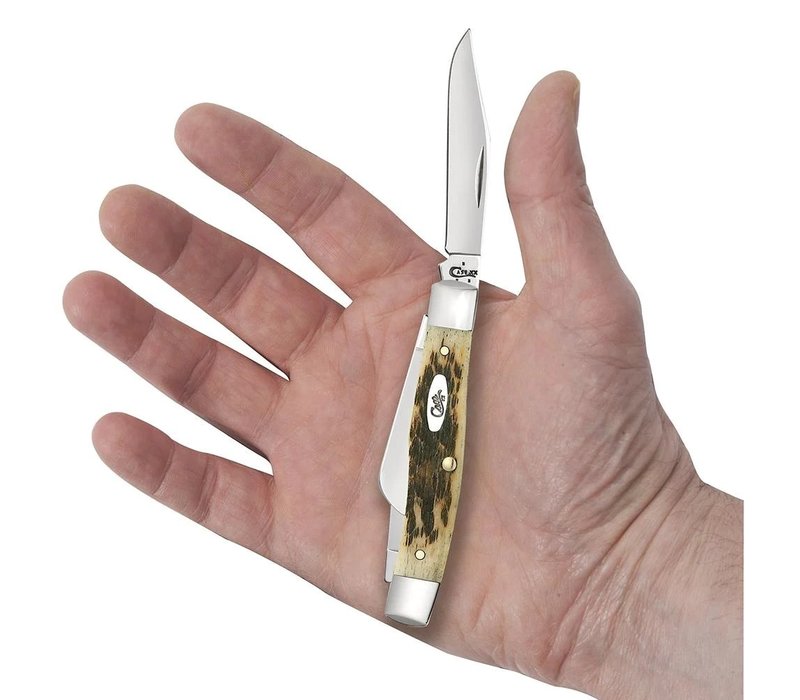 Case Medium Stockman with peach seed jig amber bone and carbon steel (CV) blades.