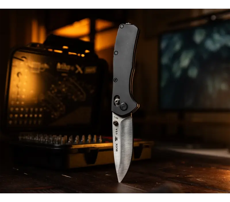 Buck Range Elite with a black and aluminum handle and a CPM Magnacut blade