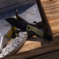 CIVIVI Hid with a green G10 handle and a Sandvik 14C28N stainless steel blade