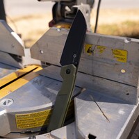 CIVIVI Hid with a green G10 handle and a Sandvik 14C28N stainless steel blade