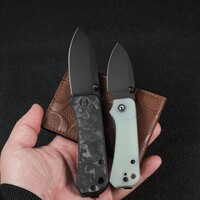 Civivi, Baby Banter with a Black Blade and Natural G10 Handle. Also the Nitro-V stainless blade