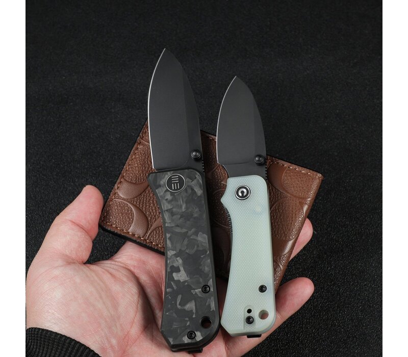 Civivi, Baby Banter with a Black Blade and Natural G10 Handle. Also the Nitro-V stainless blade