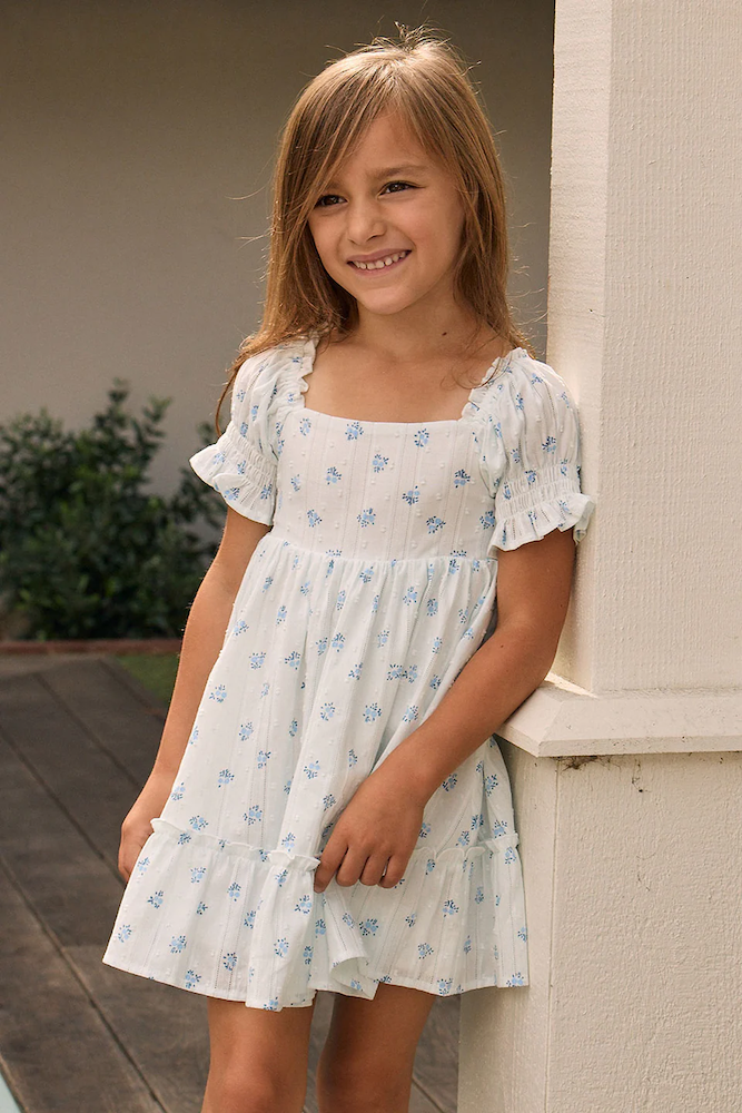 Kids Allima Mini Dress in White w/ Blue Floral - Adorn Boutique