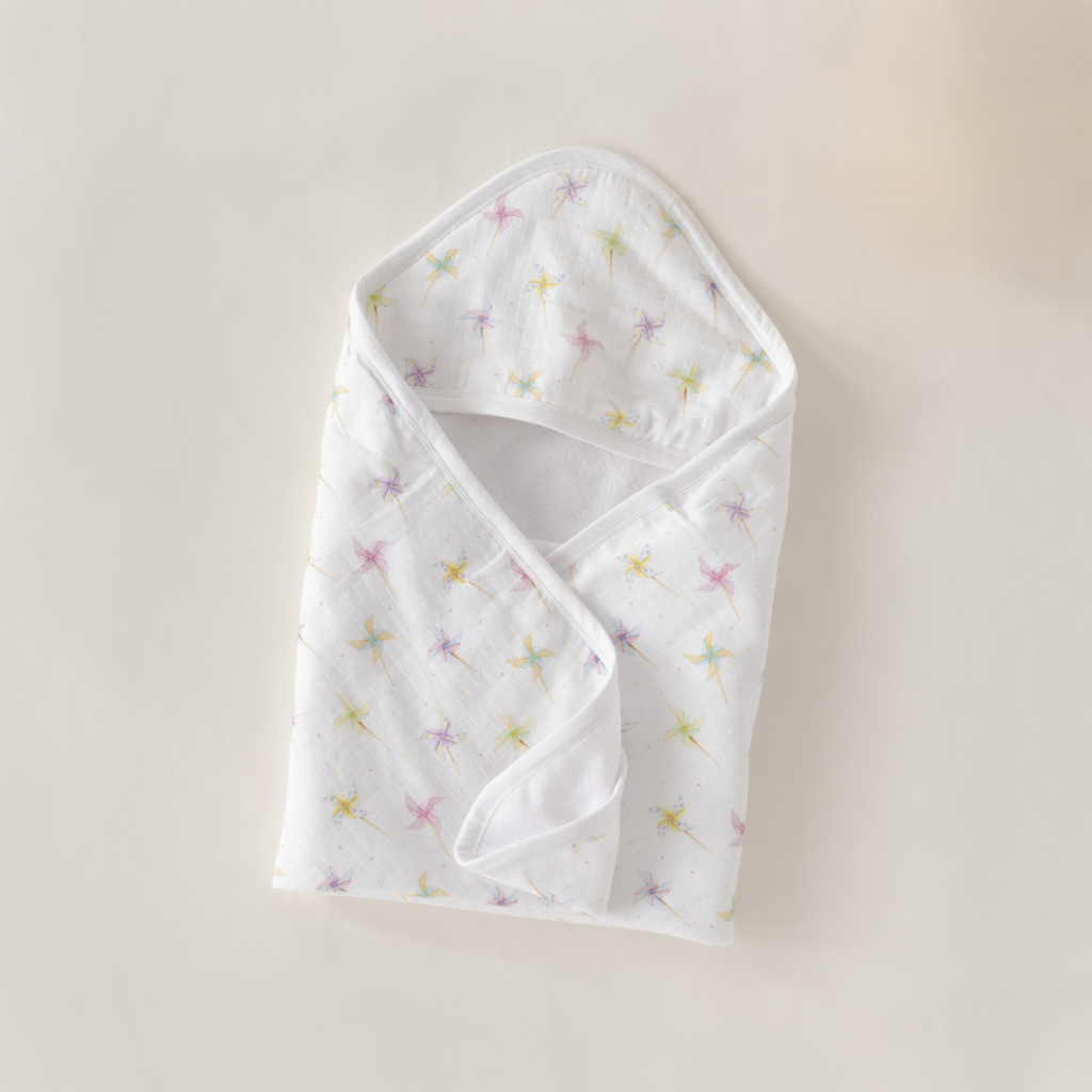 NOLA TAWK PINWHEEL PARTY MUSLIIN HOODED BABY TOWEL