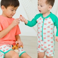 RuffleButts + RuggedButts Dolphin Hem Swim Trunks