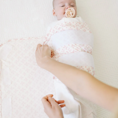 THE UPTOWN BABY PINK CLOVER SWADDLE
