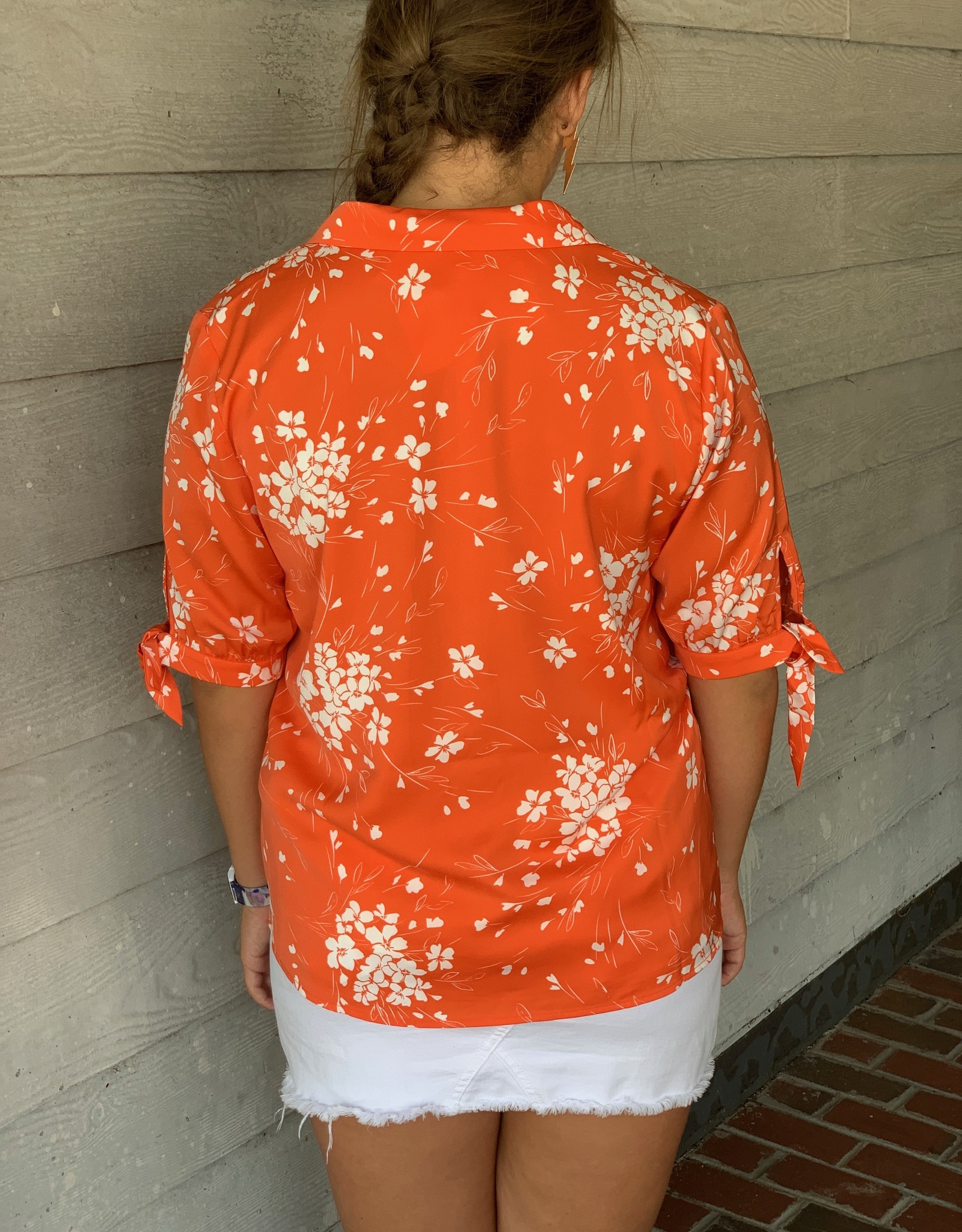 orange floral jacket