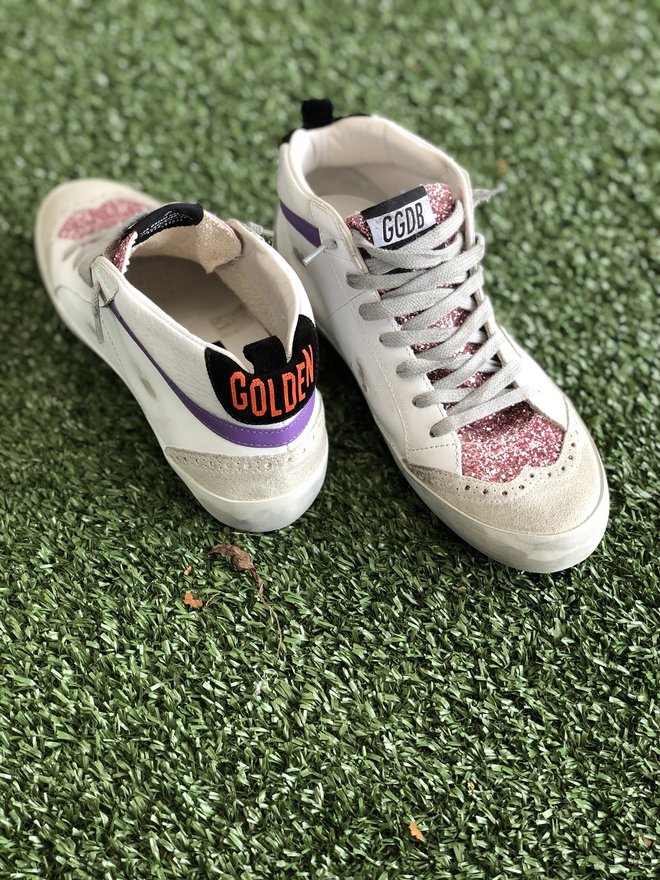 pink and gold golden goose