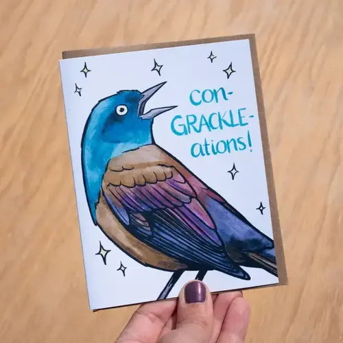 laurel mundy Con-Grackle-Ations Greeting Card