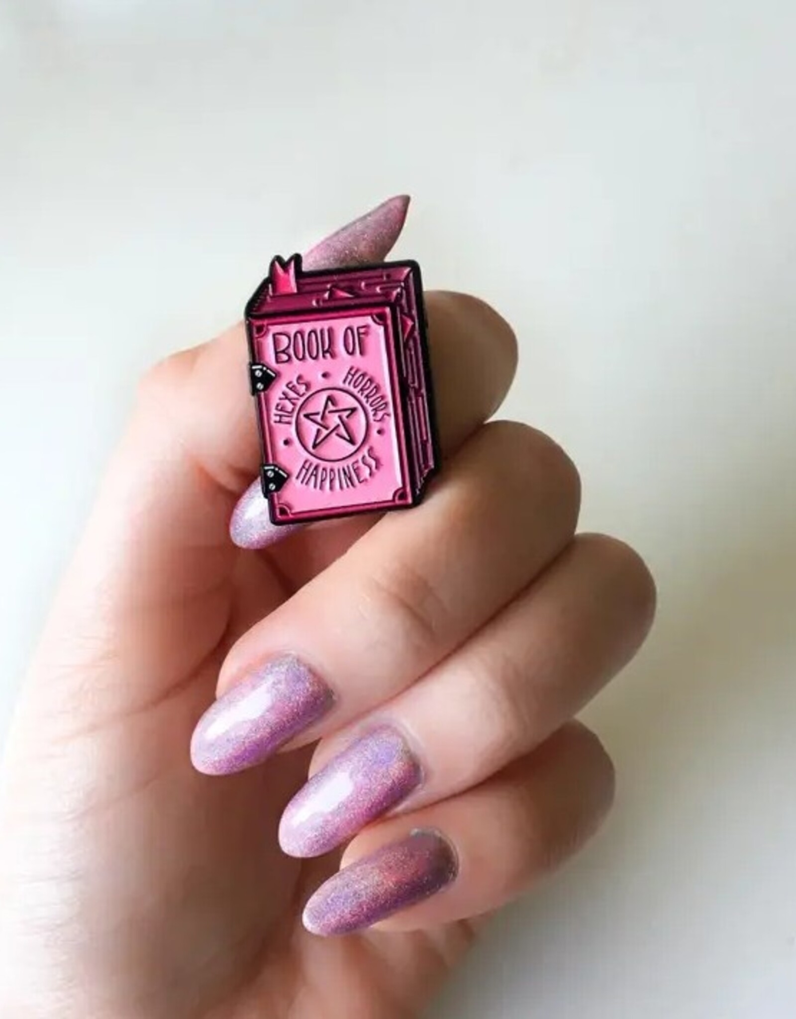 -Book of Hexes, Horrors, and Happiness Grimoire Enamel Pin