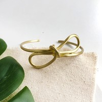 WorldFinds Bracelet | Sculptural Bow Cuff | Gold