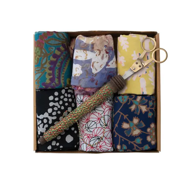 https://cdn.shoplightspeed.com/shops/626275/files/57851708/600x600x1/creative-co-op-gift-wrap-kit-vintage-cotton-sari.jpg