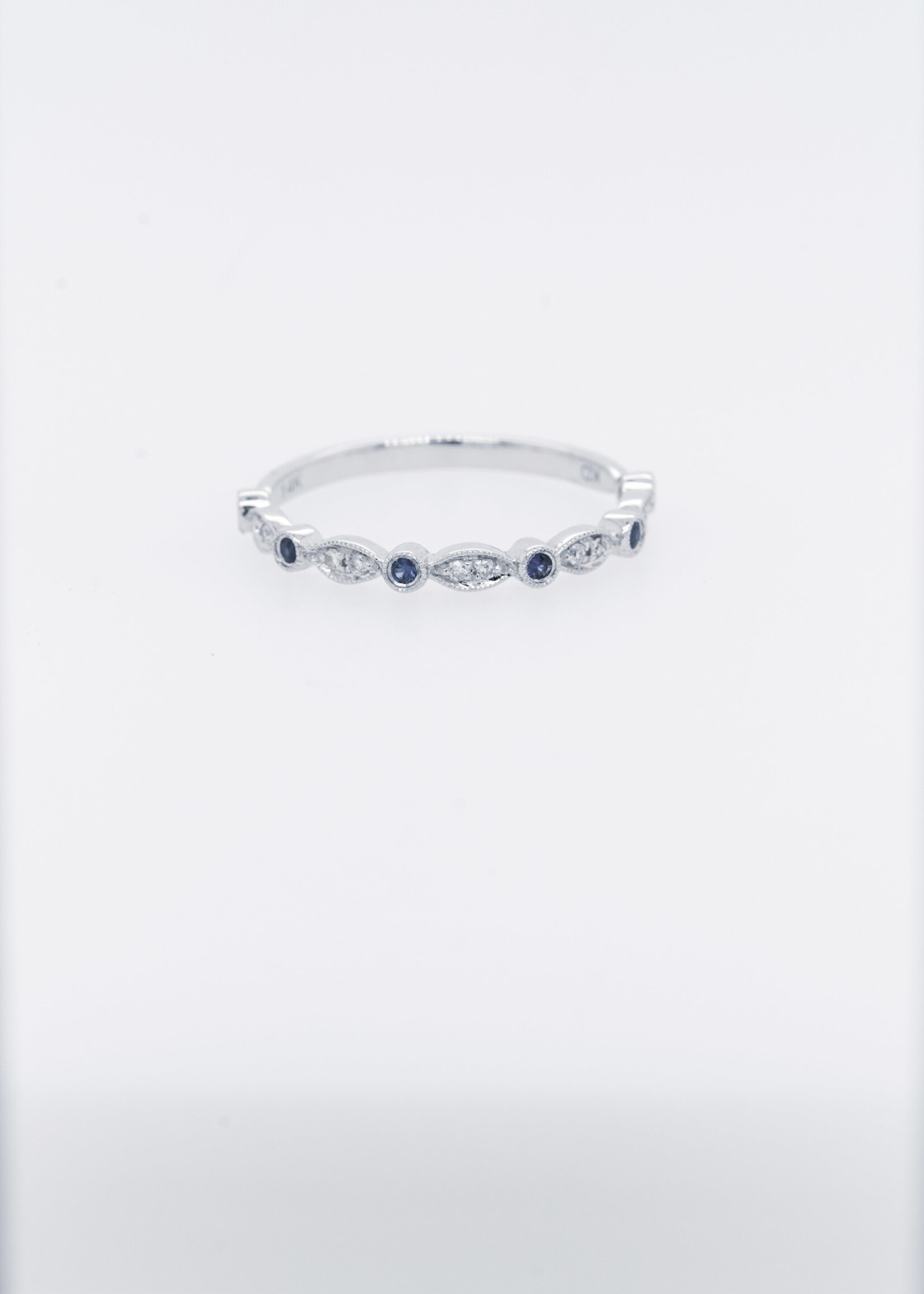 14KW 1.3g 0.10ctw Diamond 0.12ctw Sapphire Stackable Band (size 7)