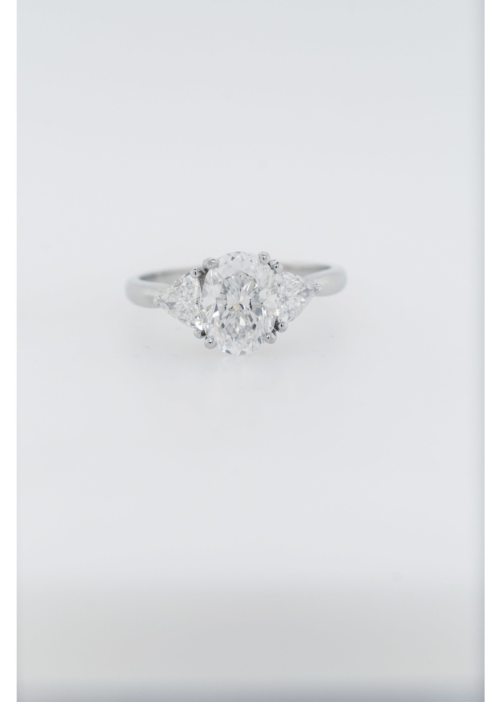 Platinum 5.29g 3.02ctw (2.24ctr) H/SI1 Oval Diamond 3-Stone Engagement Ring (size 7.5)